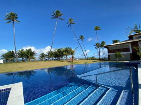 Praia de Itacimirim, pé na areia, piscina